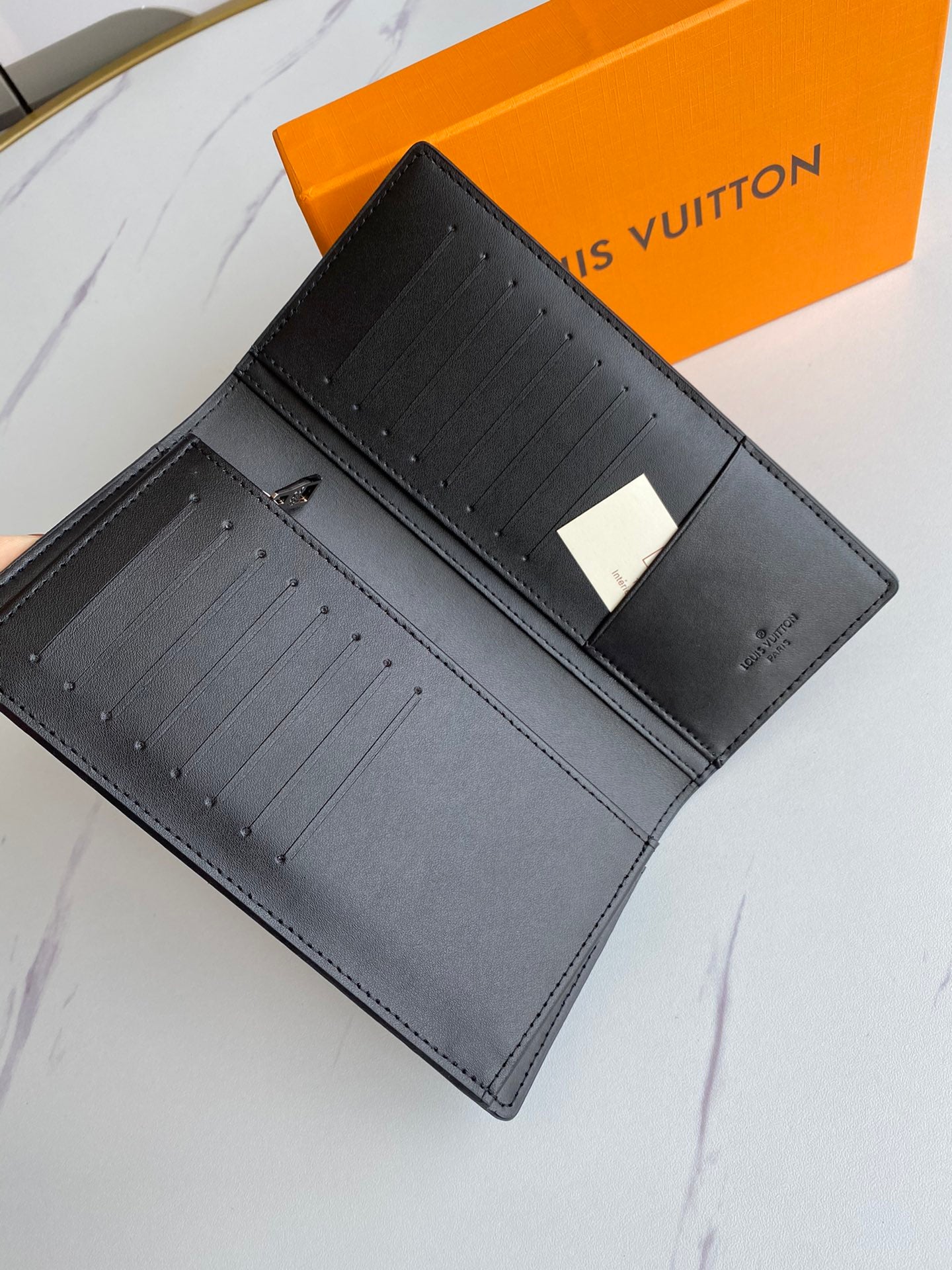 LV Brazza Embossed Monogram Wallet