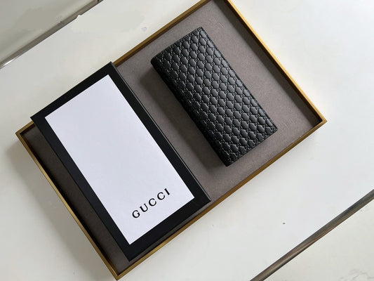 Gucci Imprint long wallet